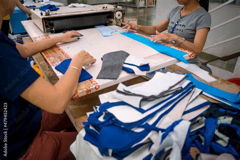 Close Up Hand Of Woman Putting The Fusing Into Fabric With Industrial