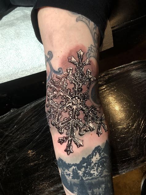 Snowflake Tattoo Meaning: Unveiling the Symbolism Behind the Designs