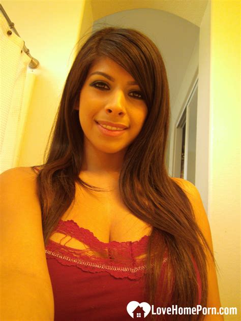 Babe Shows Off Sexy Curves At HomeMoviesTube