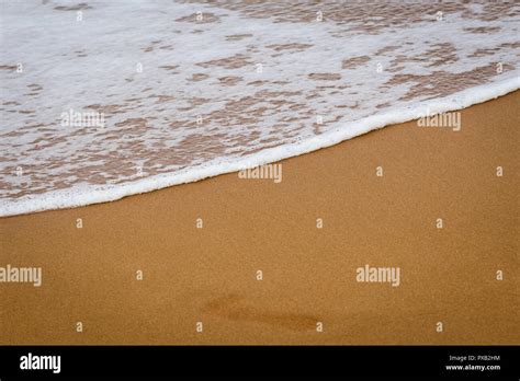 Wave On The Sand Beach Background At Ramla Bay Gozo Famous Tourist