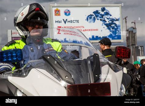 Police officer on a motorcycle patrol the street in Moscow, Russia ...