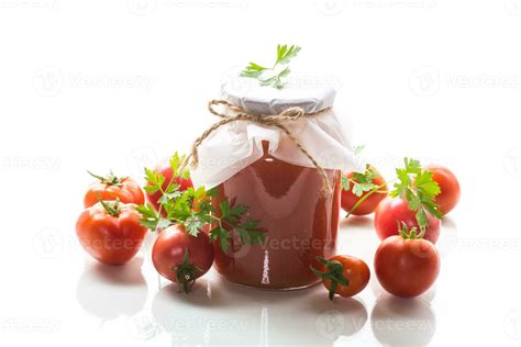 Cooked homemade tomato juice canned in a jar of natural tomatoes. 31406458 Stock Photo at Vecteezy