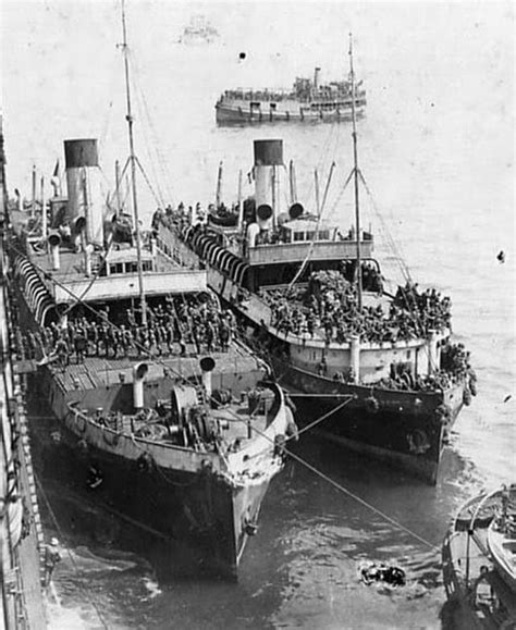 The SS Nomadic and her sister Traffic, taken sometime during World War II. : titanic