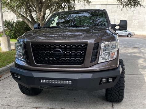 2017 Nissan Titan Xd With 20x12 44 Black Rhino Armory And 37135r20 Nitto Ridge Grappler And