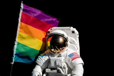 Premium AI Image Astronaut Waving LGBTQ Pride Flag Representation Of Pride Month And Gay