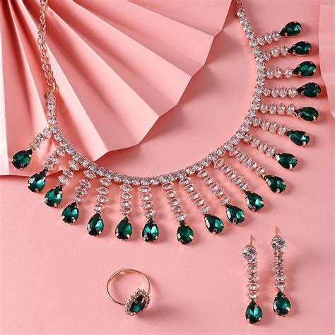 Buy Zaveri Pearls Green Dazzling Cubic Zirconia Necklace Earrings