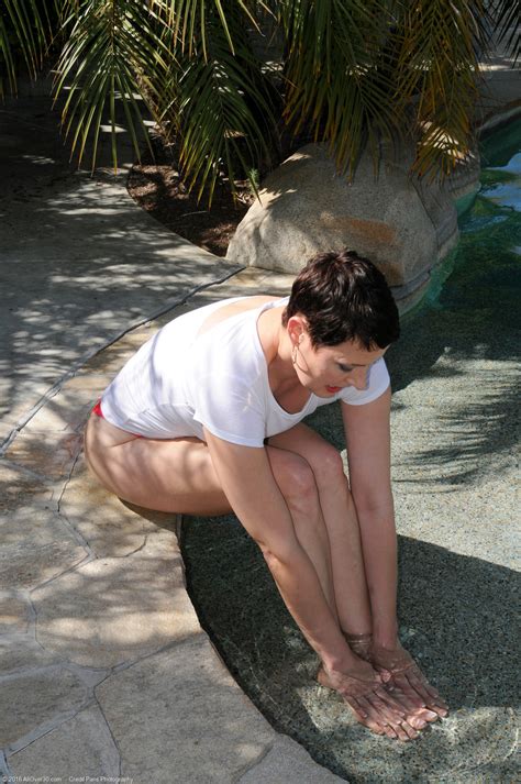 Short Haired Mature Kali Karinena Unveils Her Cunt And Tiny Tits In The Pool CoedCherry