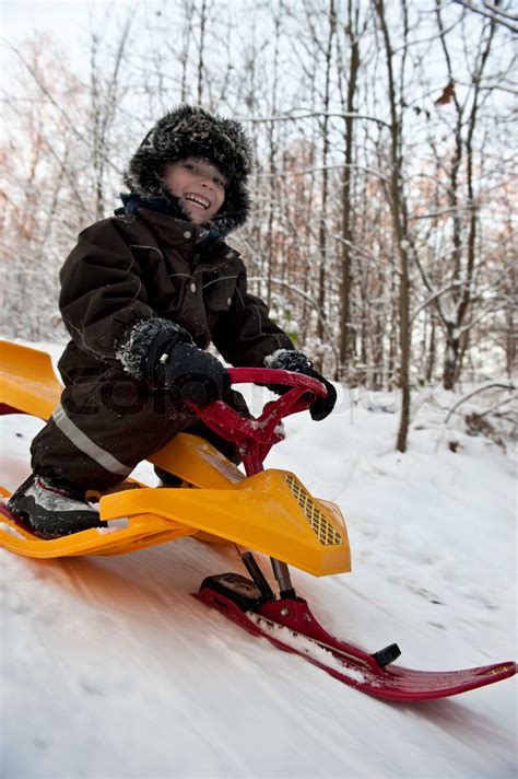 Fun on snow sledge | Stock image | Colourbox