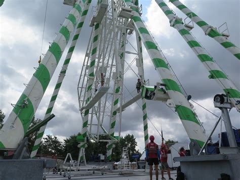 Reinventing the wheel: As State Fair nears, giant ride rises again