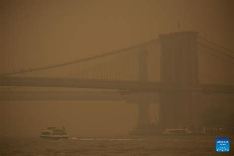 Feature New Yorkers Suffer Over Smoke From Canadian Wildfires Xinhua