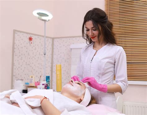 Spa Woman Applying Facial Cleansing Mask Stock Image Image Of