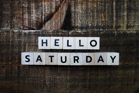 Hello Saturday Text On Black Letter Board And Bouquet Colorful Flowers