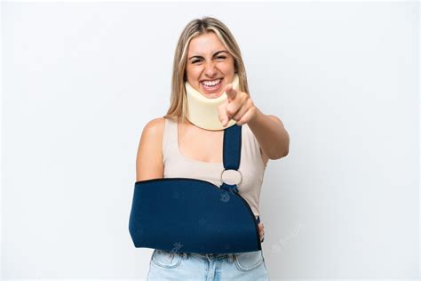 Premium Photo | Woman with broken arm and wearing a sling isolated on ...