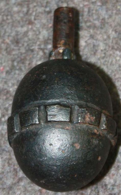 A Wwi German Egg Grenade In Grenades