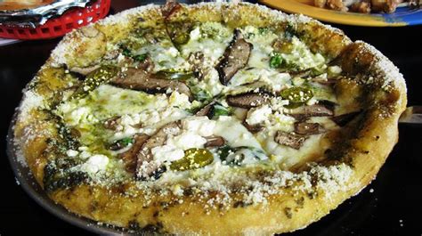 The Magical Mystery Pizza At Mellow Mushroom Pizza Has A Pesto Base