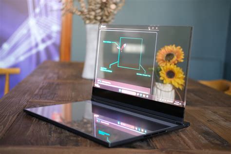 Прозрачный корпус, клавиатура-проектор и камера с ИИ: Lenovo показала ...