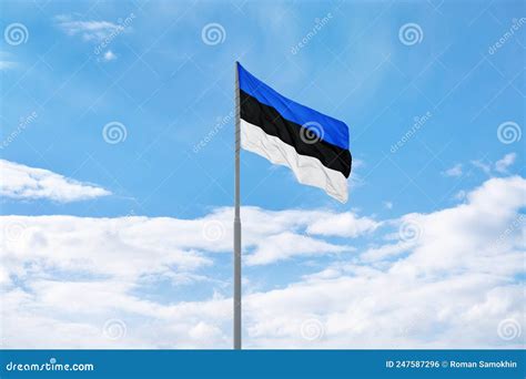 Estonian Flag In Front Of Blue Sky And Clouds Stock Photo Image Of