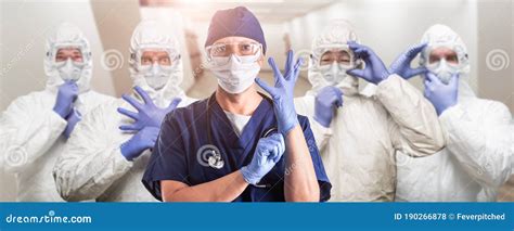 Team Of Female And Male Doctors Or Nurses Wearing Personal Protective