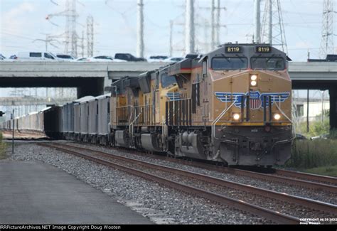 With A C45AH On The Point A Loaded Rock Train Heads East