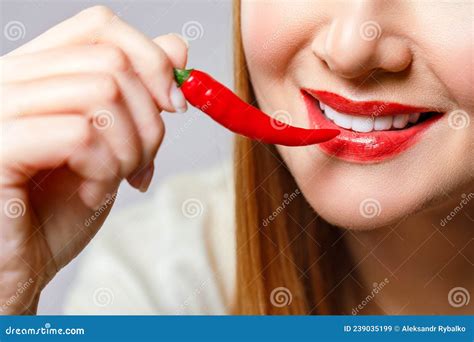 Woman With Chili Red Pepper Isolated En Blue Background Female Lips Hot Seductive Girl Stock