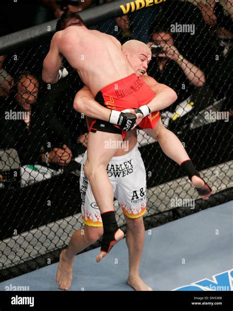 July 8, 2006:Tito Ortiz picks up Ken Shamrock for a slam at UFC 61 at ...