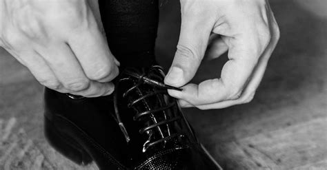 Hands Tying Shoe · Free Stock Photo