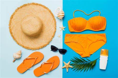 Woman Swimwear And Beach Accessories Flat Lay Top View Top View With Bikini Outfit On Color