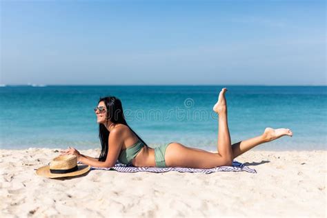 Suntan Beach Vacation Luxury Woman Sunbathing By Overwater Bungalow