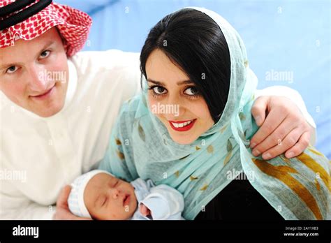 Arabic Muslim Couple With New Baby At Home Stock Photo Alamy