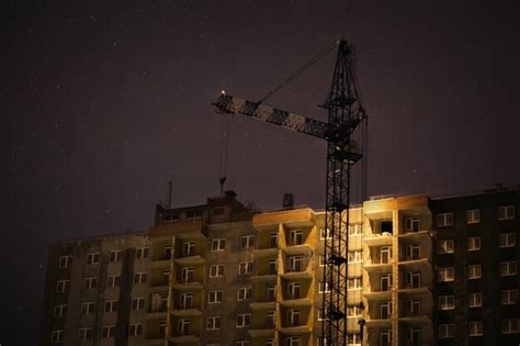 Premium Photo | Construction crane at night