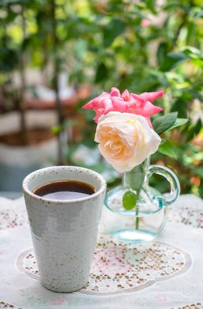 Premium Photo Close Up Of Rose In Glass On Table