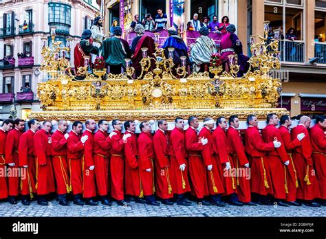 Men Carrying A Float During Semana Santa Holy Week Malaga Andalucia