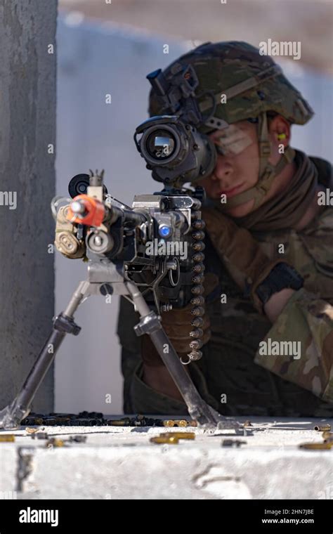 U S Army Trooper Private Michael Huges A Squad Automatic Weapon Gunner Assigned To 2nd Platoon