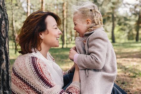 Mother And Daughter Under The Pines By Stocksy Contributor Evgenij