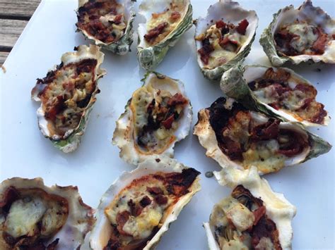 Bbq Oysters With Garlic Shallots Bacon And Pepperjack Cheese