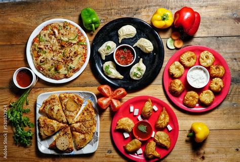 Top view of momos and pizza Stock Photo | Adobe Stock