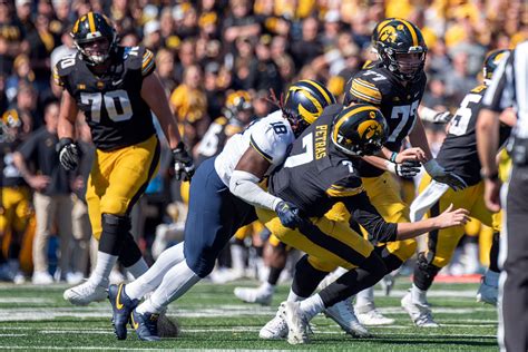 Now at Michigan, how Eyabi Okie’s grandma saved his career