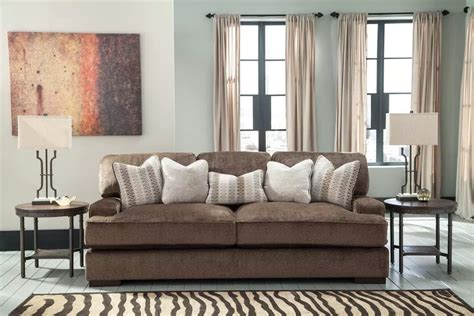 Dark Brown Sofa With Blue Pillows Baci Living Room