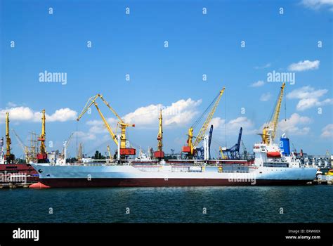 Port Warehouse With Containers And Industrial Cargoes Stock Photo Alamy