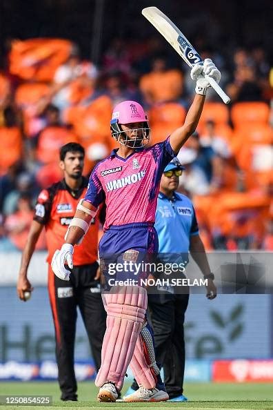 Rajasthan Royals' Yashasvi Jaiswal raises his bat as he celebrates ...