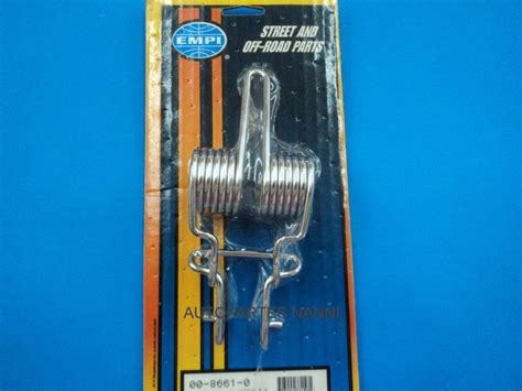 C8 RT03 RESORTE TAPA MOTOR EMPI CROMADO 8661 Autopartes Nanni