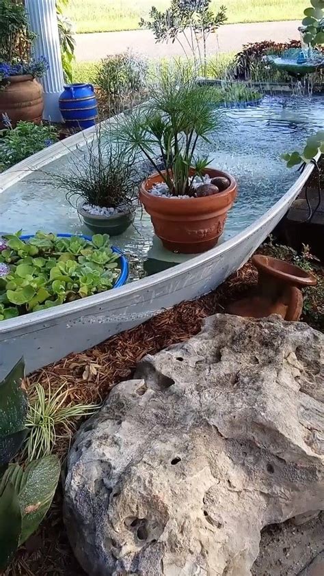 Vt This Old Boat Was Turned Into An Incredible Water Feature Garden