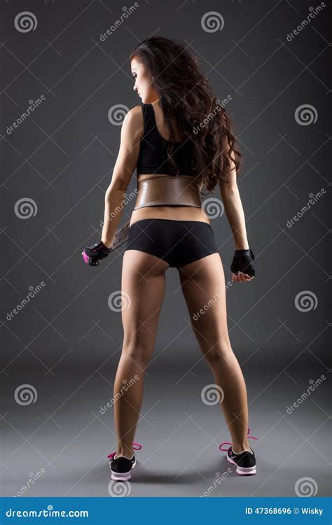 Rear View Of Female Athlete Posing In Studio Stock Photo Image Of