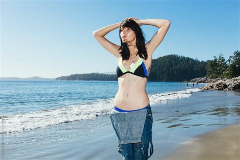 Beautiful Girl In A Bikini On The Beach In Tofino Canada By Stocksy