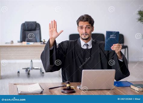 Young Male Judge Taking Oath on Holly Bible Stock Photo - Image of ...