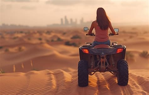 Premium Photo Atv Rider In The Desert Of Dubai On Sand Dunes