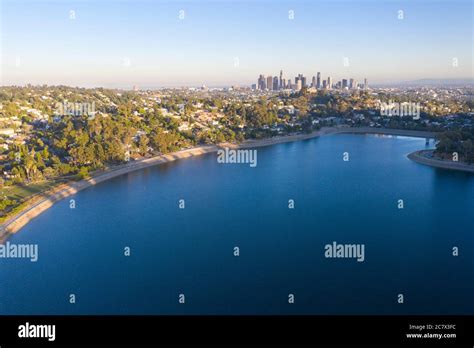 Aerial view of Silver Lake Reservoir with downtown Los Angeles skyline ...