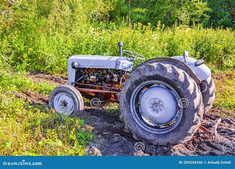 Tractor Stuck In The Mud Stock Image | CartoonDealer.com #56525185