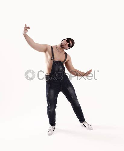 Nice man dancing break dance in the Studio isolated on - stock photo ...