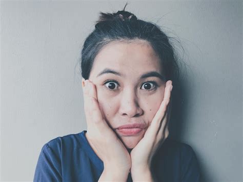 Premium Photo Close Up Portrait Of Shocked Woman Against Wall